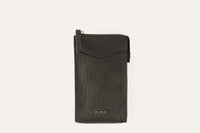 Genuine saffiano leather crossbody phone wallet with zip closure and slim profile in soft pink.