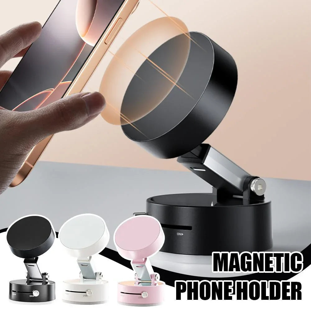 Foldable magnetic vacuum car phone holder displayed with suction cup on white background.