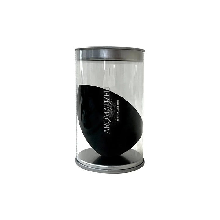 Classic Blender makeup sponge with double angled sides on a white background.