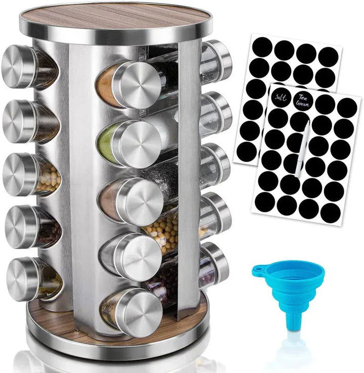 360-degree rotating stainless steel spice rack with empty jars on a kitchen countertop.