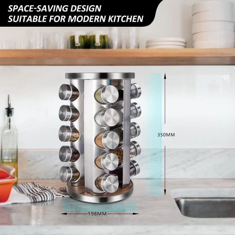 Close-up of glass spice jars with metal lids arranged neatly on rotating spice rack.