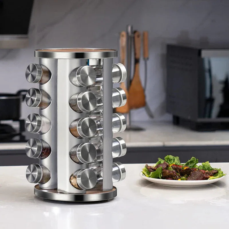 Rotating spice rack in modern kitchen setting highlighting stainless steel finish.