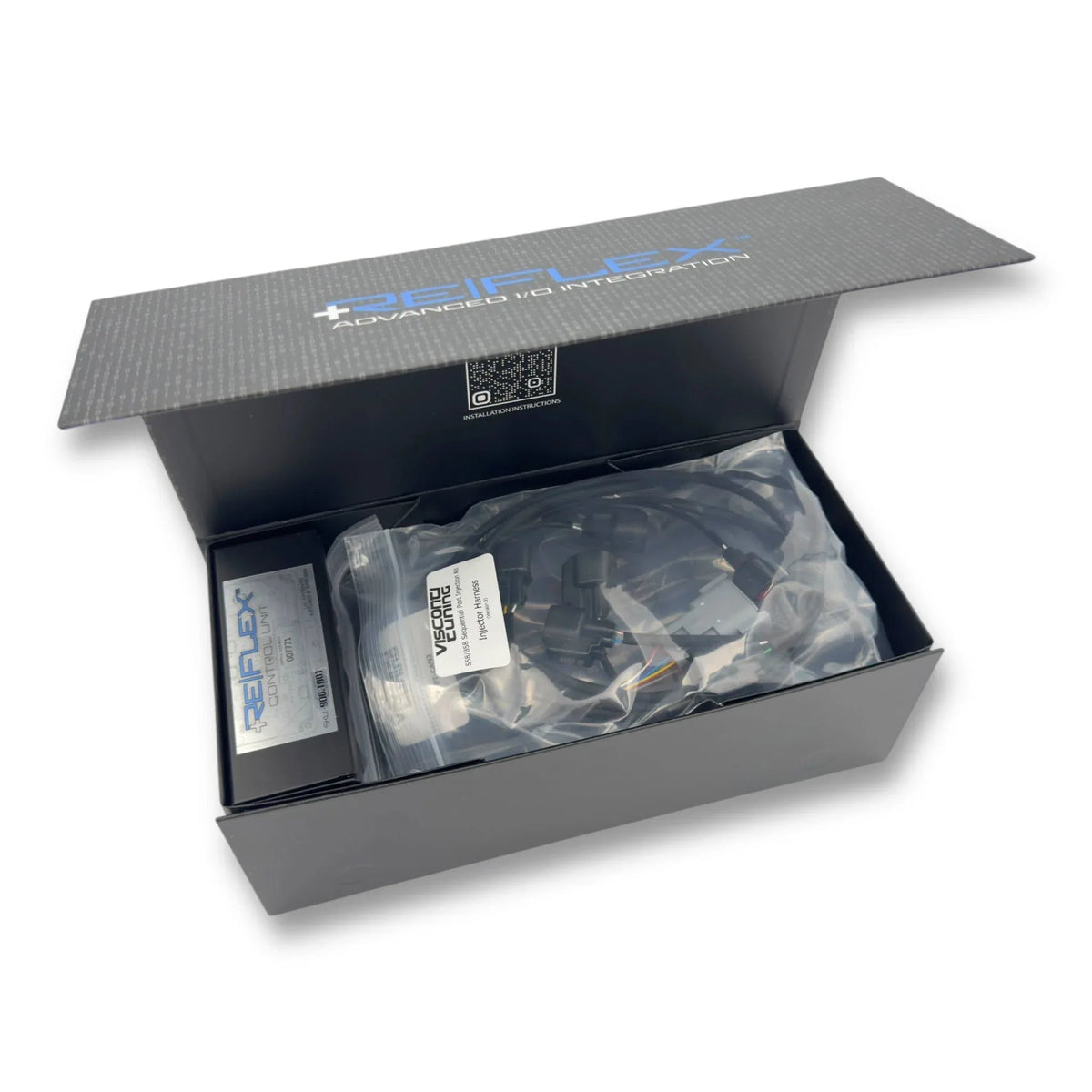 ReFlex+ Advanced I/O Integration module with BMW B58/S58 plug-n-play kit components displayed on a white background.