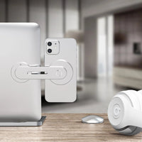 Phone held securely on laptop screen by the magnetic collapsible mount showing multifunction use.