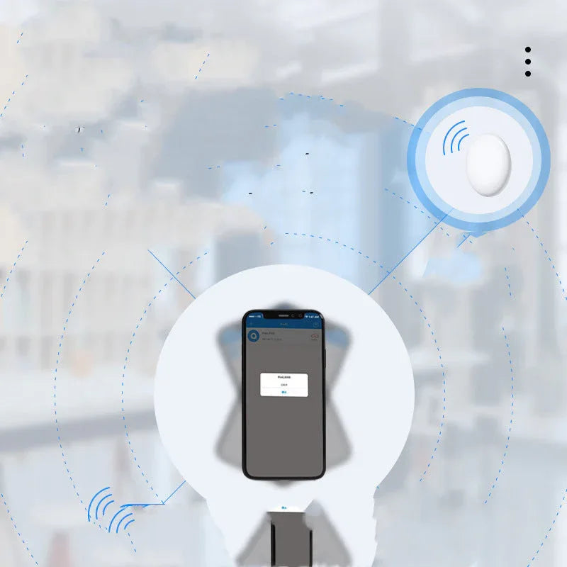Air Bluetooth key locator held in hand, illustrating its small and portable size.