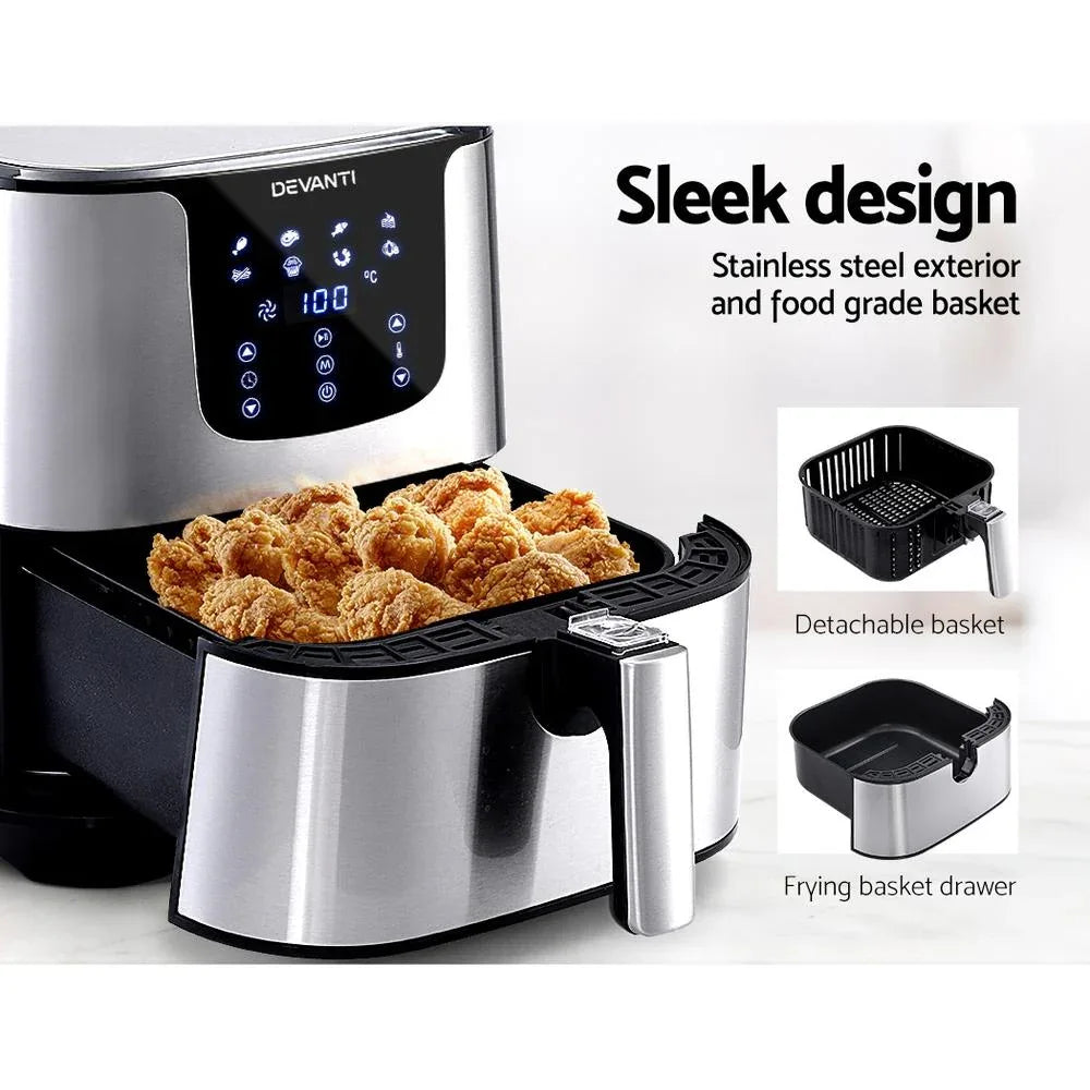 Tempered glass door of Devanti Air Fryer displaying food cooking inside.