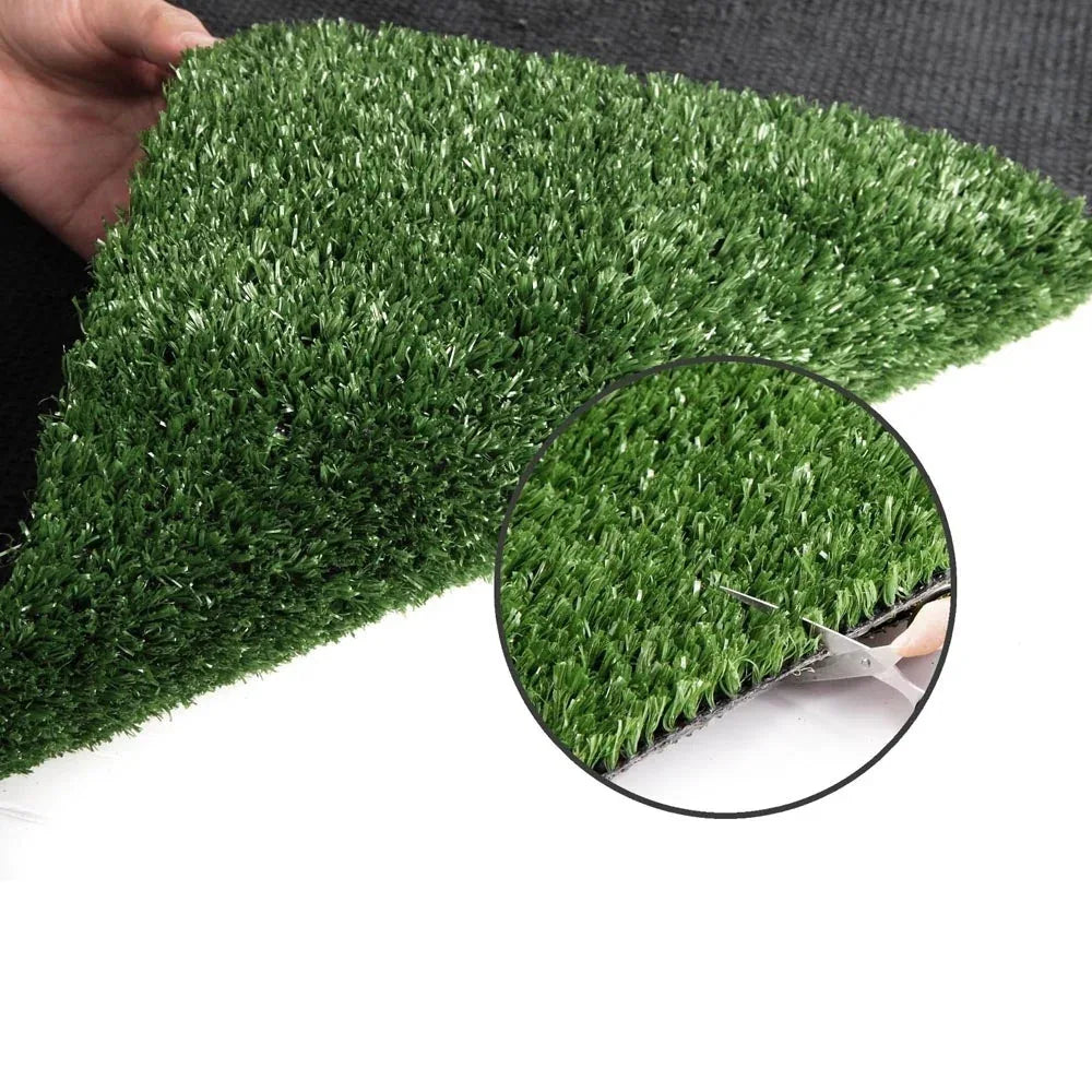 Side angle of synthetic turf illustrating thick, soft green blades resembling natural grass.
