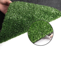 Side angle of synthetic turf illustrating thick, soft green blades resembling natural grass.