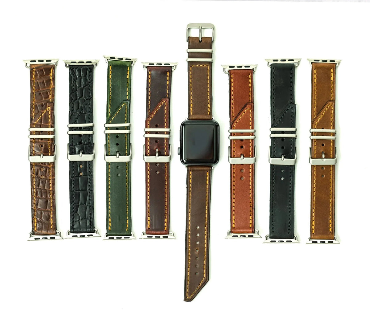 Various colors of Apple Band Designer watch bands displayed side by side on a neutral background.