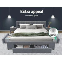 Open grey storage drawer from king size bed frame illustrating roomy under-bed storage space.