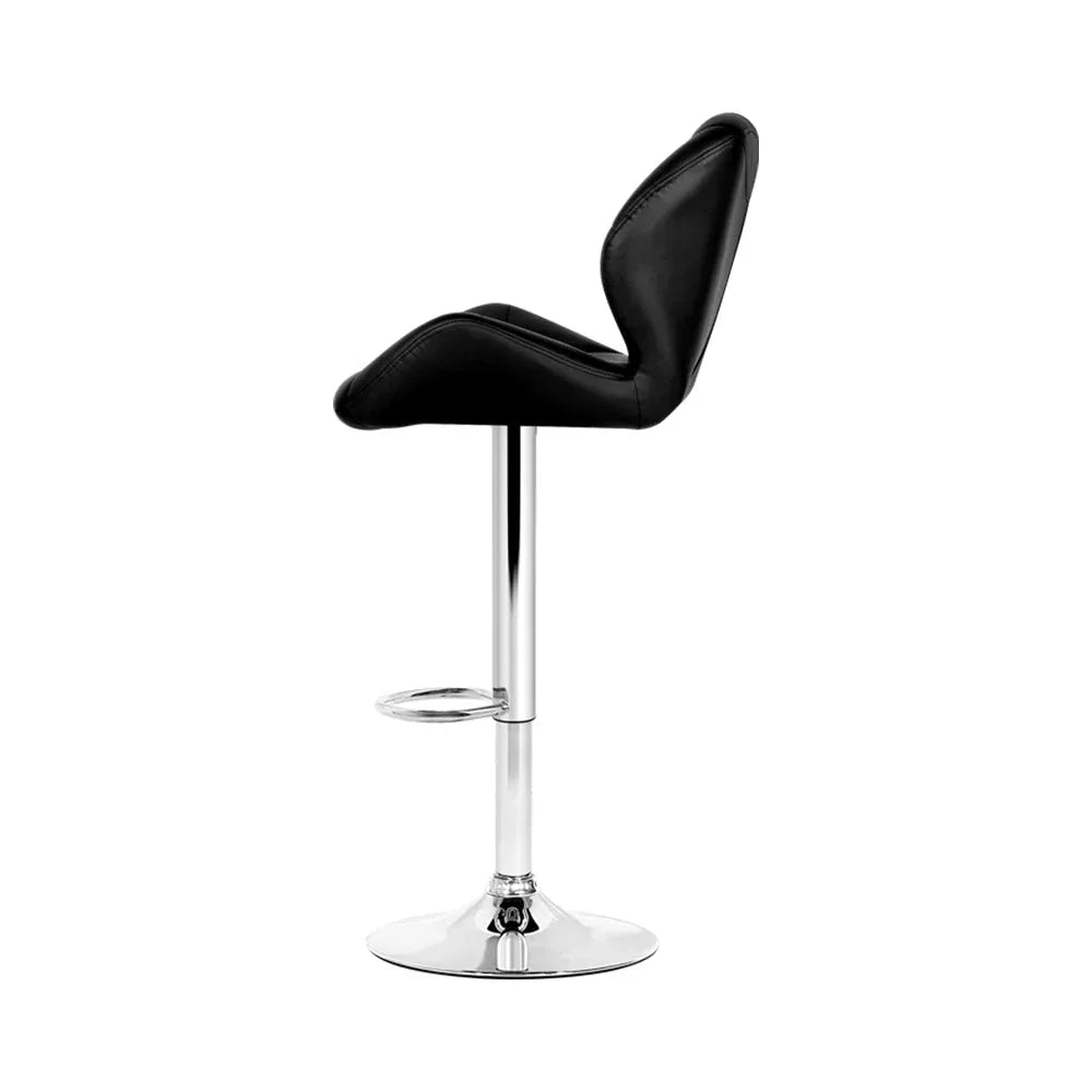 Chrome base of kitchen bar stool highlighting stable round support with floor protector
