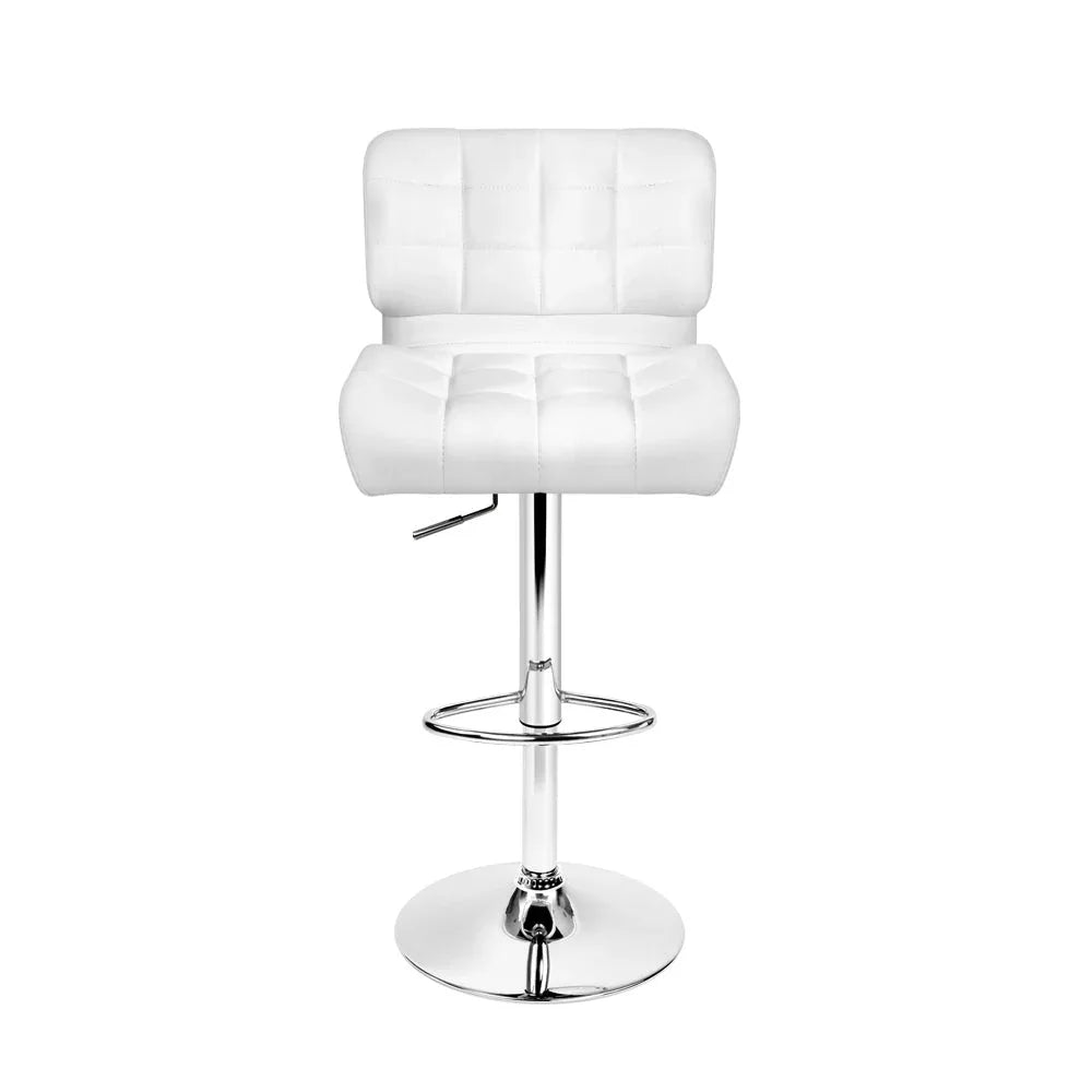 Close-up of the chrome gas lift lever beneath the white PU leather bar stool seat.