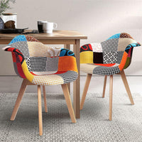 Fabric dining chair seat with smooth texture and ergonomic design highlights.