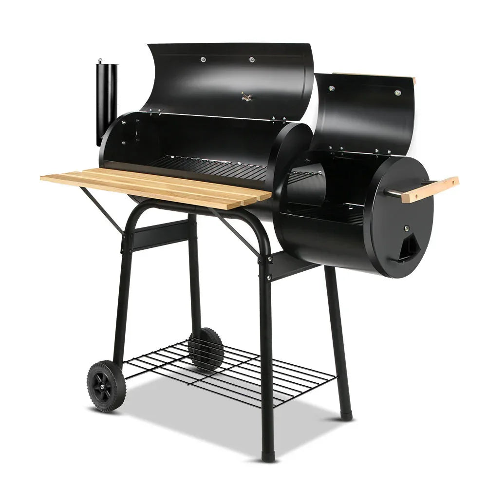 Black 2-in-1 Offset BBQ Smoker with main grill and side firebox, shown outdoors
