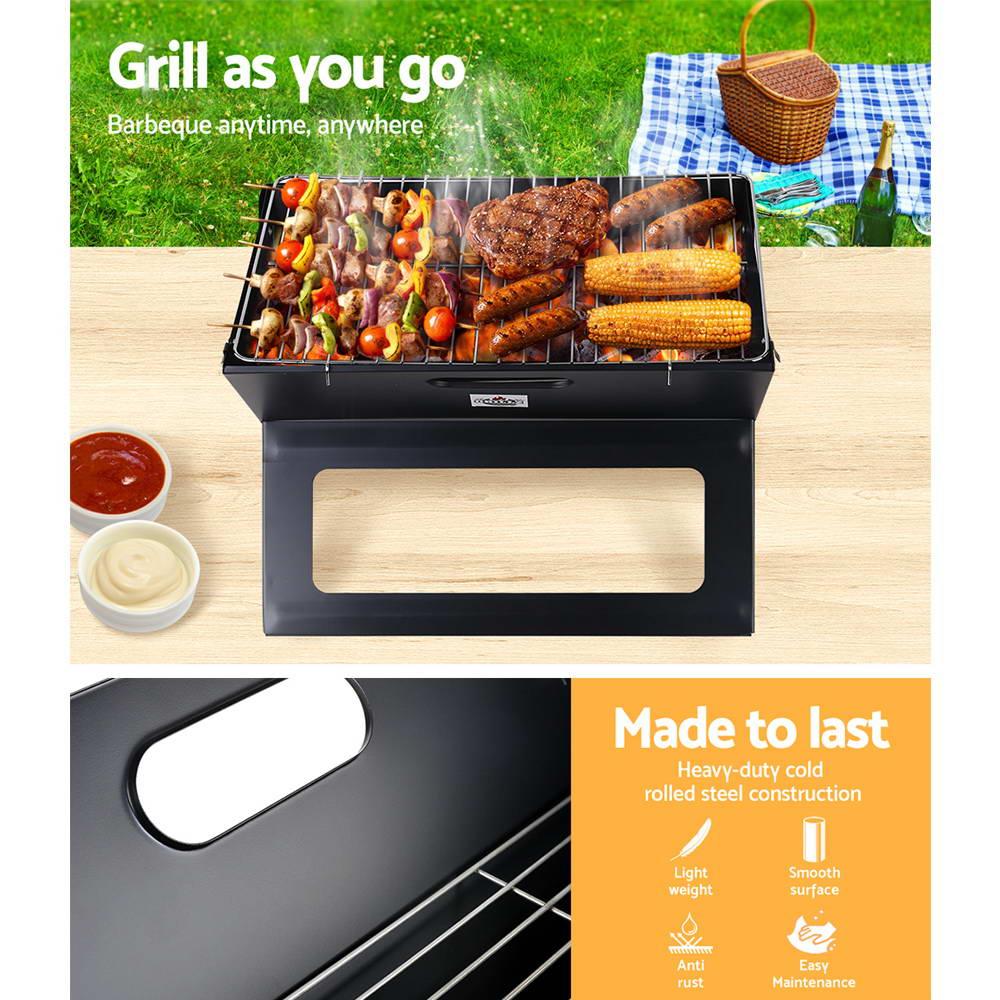 Portable charcoal BBQ grill with charcoal rack and heat-resistant paint finish