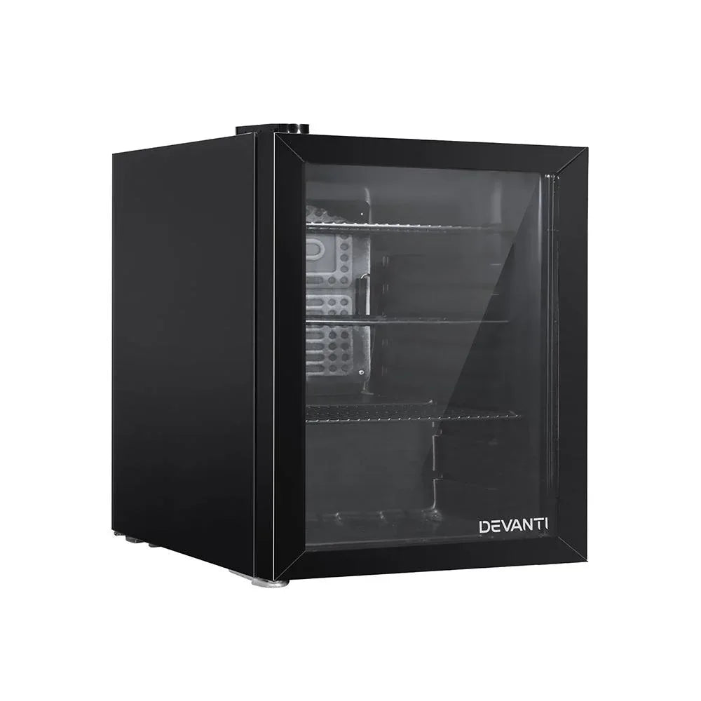 Devanti 46L compact black glass door bar fridge on a white countertop