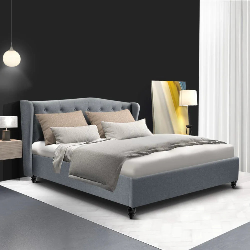 Full profile shot of Artiss Pier grey fabric bed frame with classic wingback design.