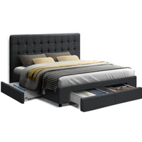 Charcoal fabric double bed frame with tufted headboard and storage drawers in bedroom setting.