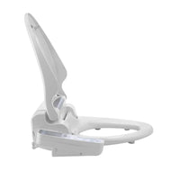 Electronic bidet seat installed on a modern toilet in a bathroom setting.
