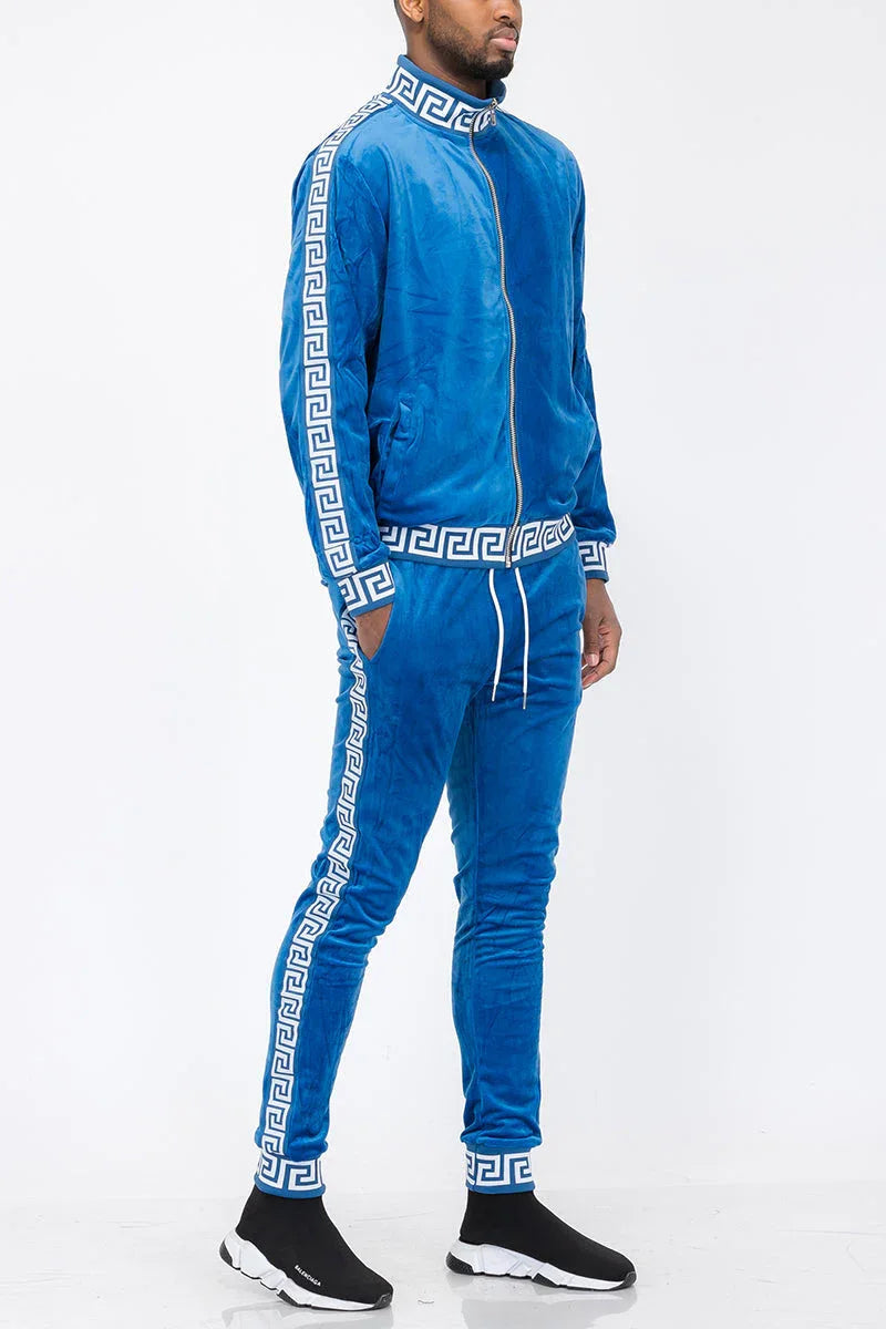 Blue and white velour track jacket and pants set displayed flat for product view.