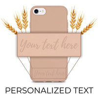 Pastel pink biodegradable phone case shown with its natural texture on a white background.