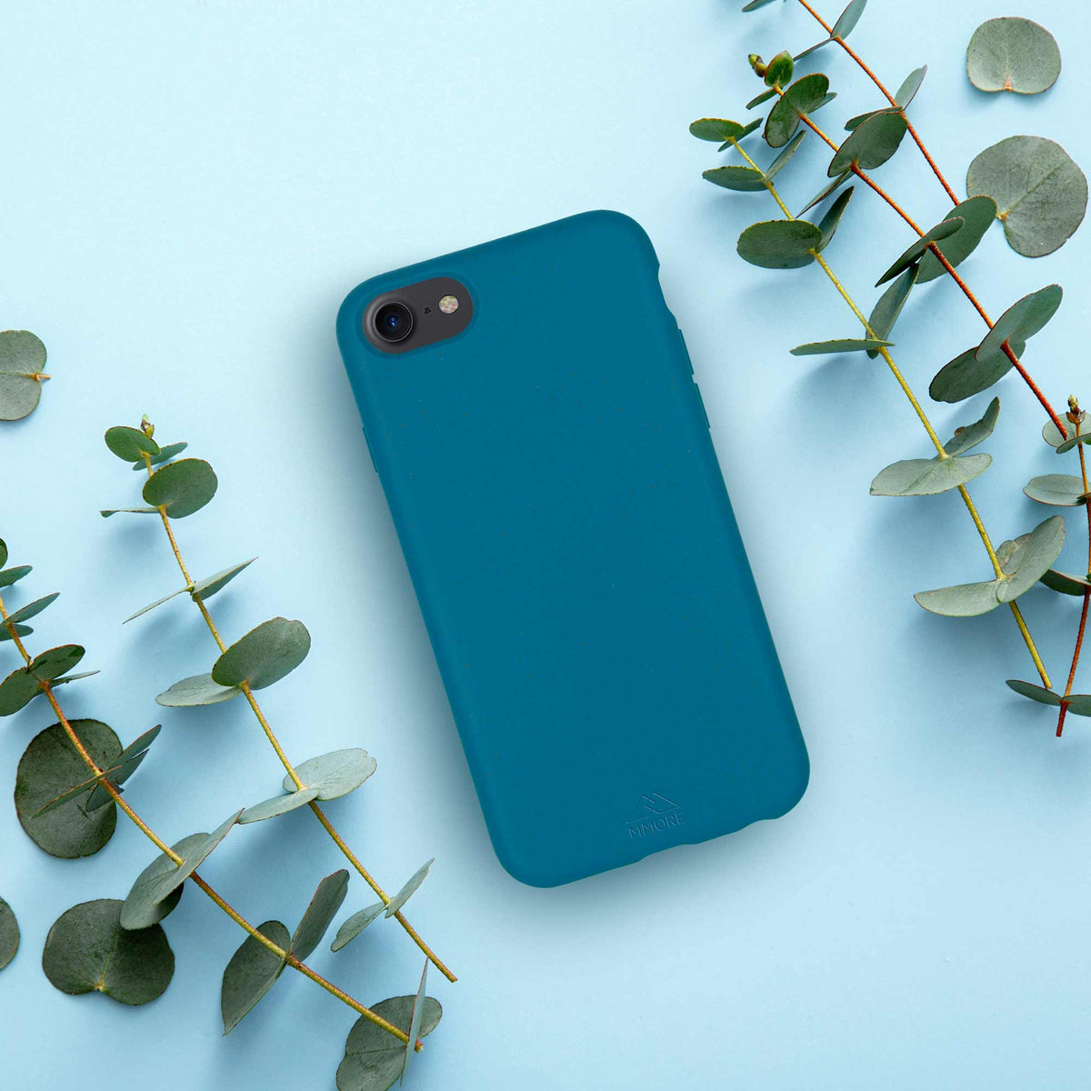 Biodegradable phone case in Deep Blue Ocean color displayed against soft background.