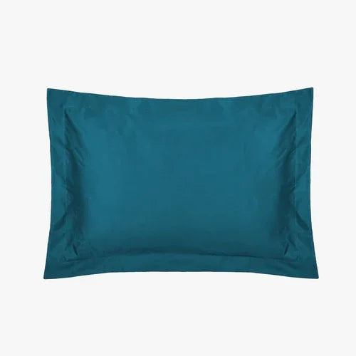 Close-up of teal Egyptian cotton duvet cover highlighting soft, durable fabric with fine stitching.