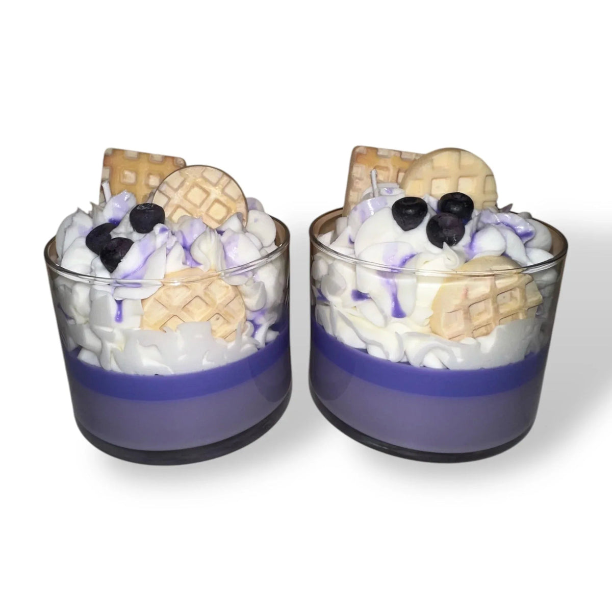 Two Blueberry Waffle decorative candles placed together showing realistic blueberry details.