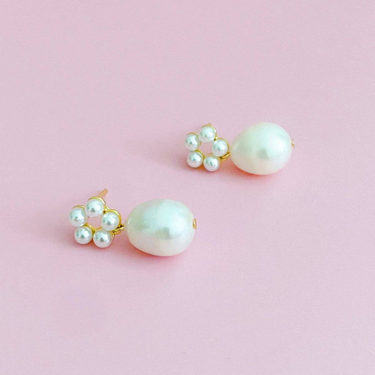 Front view of Blooming Freshwater Pearl Drop Earrings showing pearl circle and single drop.