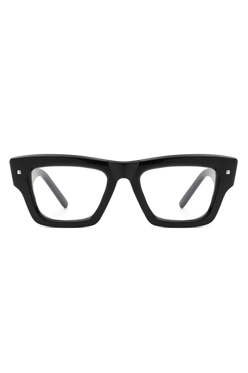 Black retro square cat eye sunglasses viewed from above on white surface.