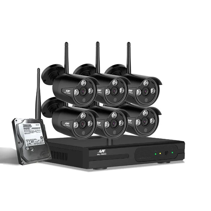 UL-tech 8-channel wireless CCTV security camera mounted outdoors with visible antennas and wiring.