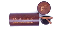 Bamboo case for sunglasses shown from back with textured wood finish and secure clasp.