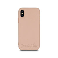 Horizontal view of personalized compostable pastel pink phone case for iPhone XS.