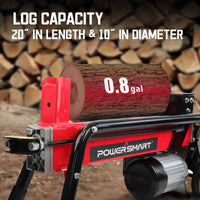 Electric log splitter in action splitting a thick log outdoors.