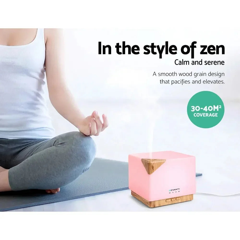 DEVANTi Aroma Diffuser placed on wooden table with ambient lighting