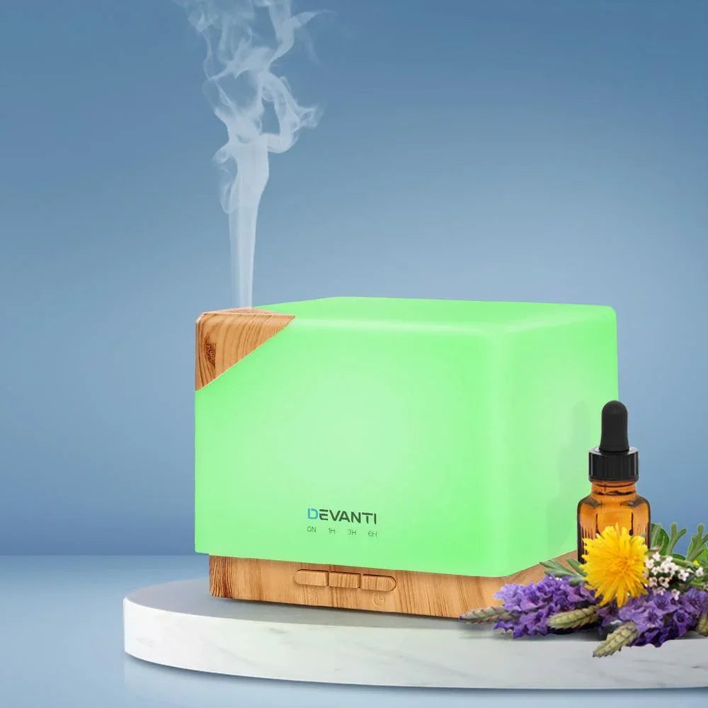 DEVANTi Aroma Diffuser emitting mist with gentle light in cozy setting