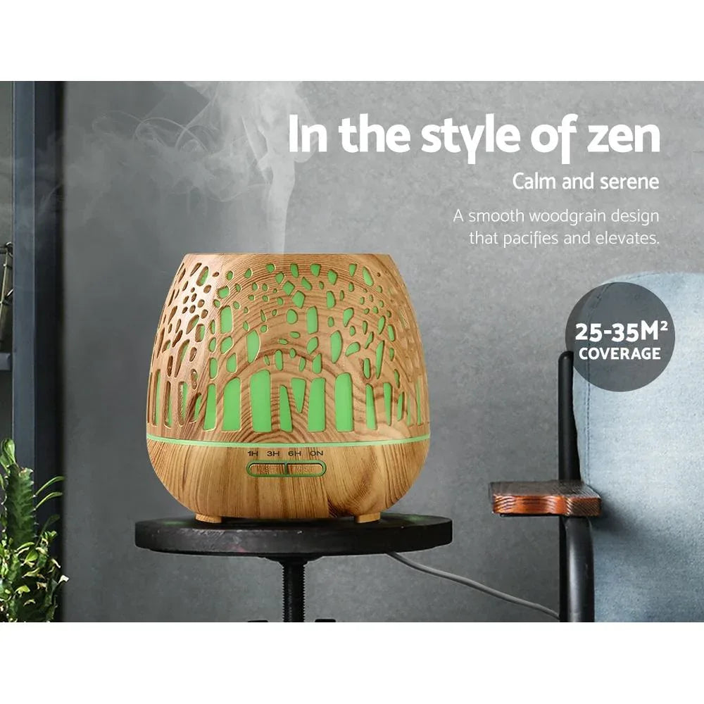 Devanti diffuser producing fine mist with evening lights in a calm setting