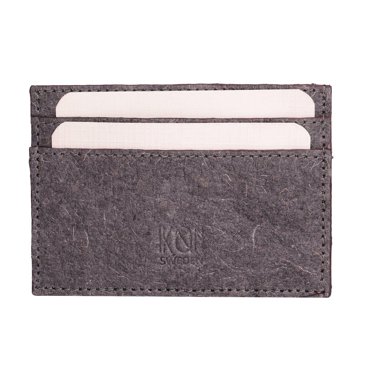 Dark grey coconut leather card holder partially open displaying inner pockets and card slots.