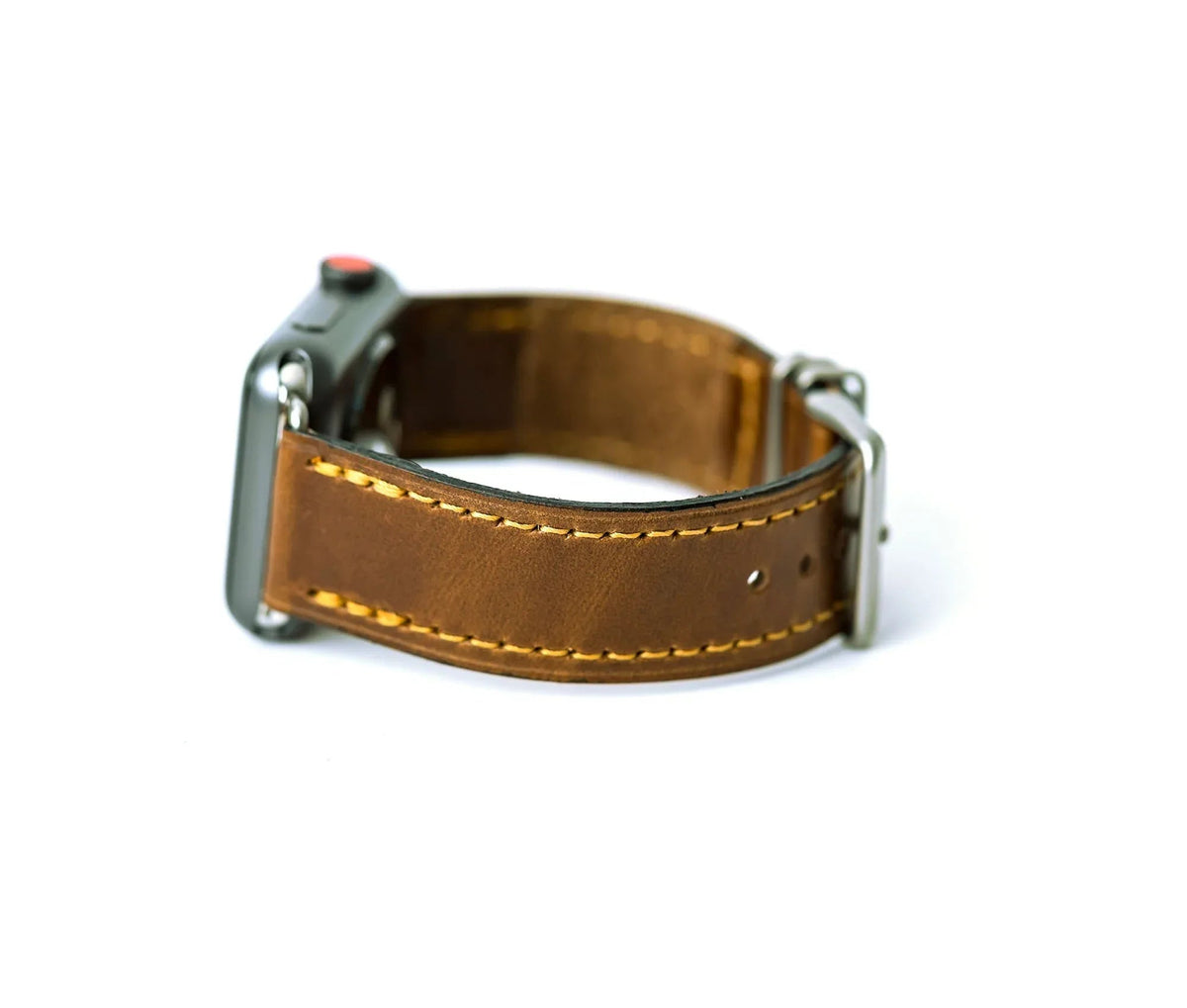 Side profile of brown leather Apple Band Designer watch band demonstrating thickness and texture.