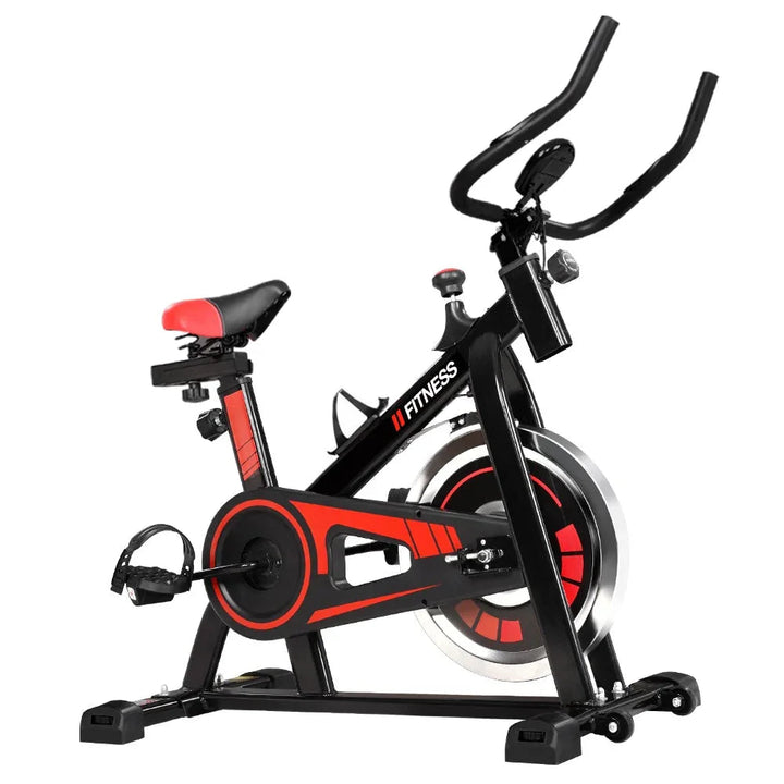 Black spin bike angled view showing flywheel and frame design