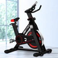 Rear view of the exercise bike showcasing the powder-coated steel frame construction.