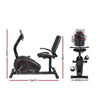 Close-up of the bike's adjustable padded seat and upright backrest with sturdy frame in black.