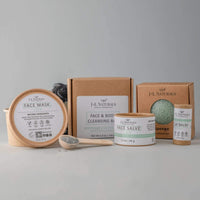 Calm set for sensitive skin showing cleansing bar and konjac sponge with natural elements.