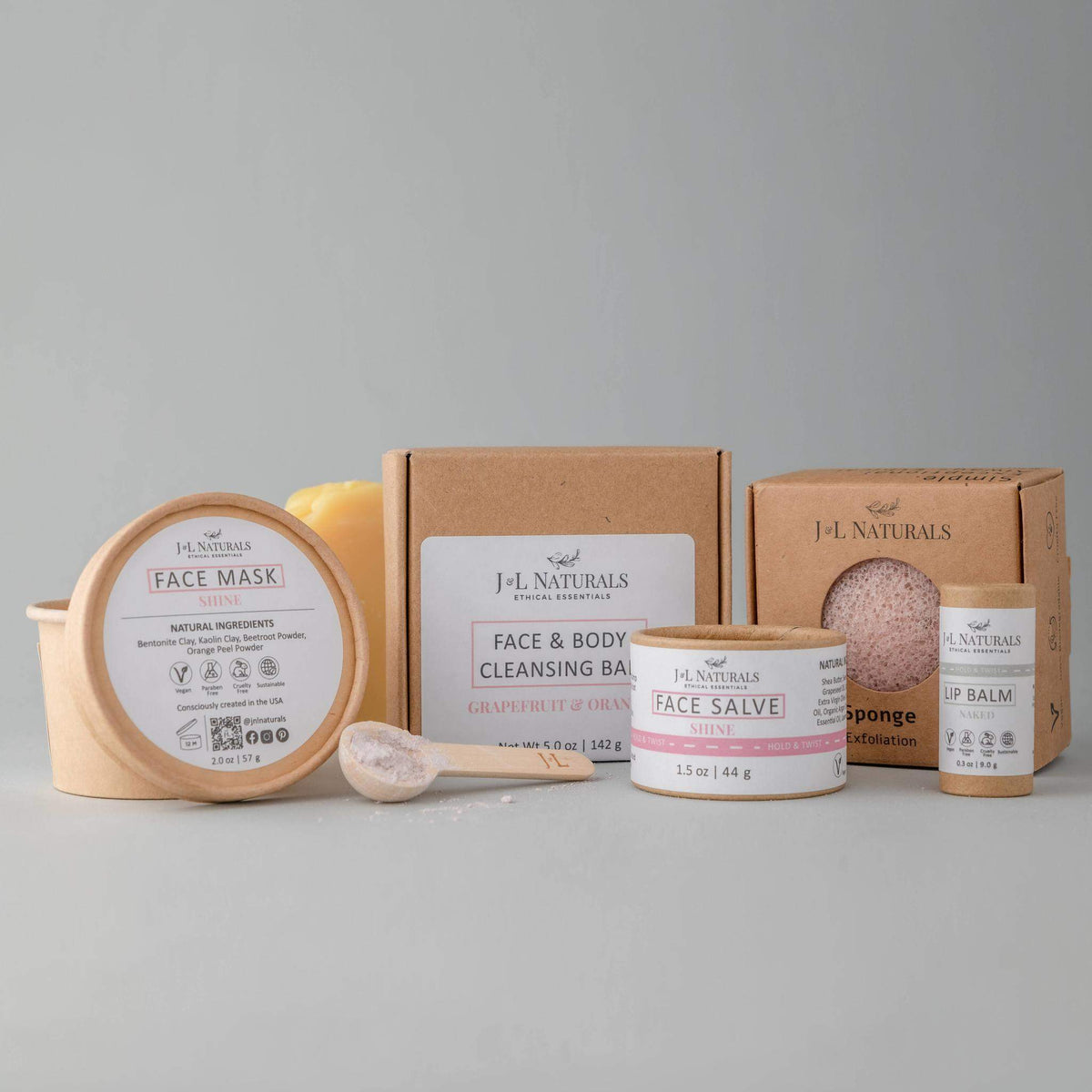 Shine set for normal to dull skin displayed with cleansing bar, face mask, and sponge.