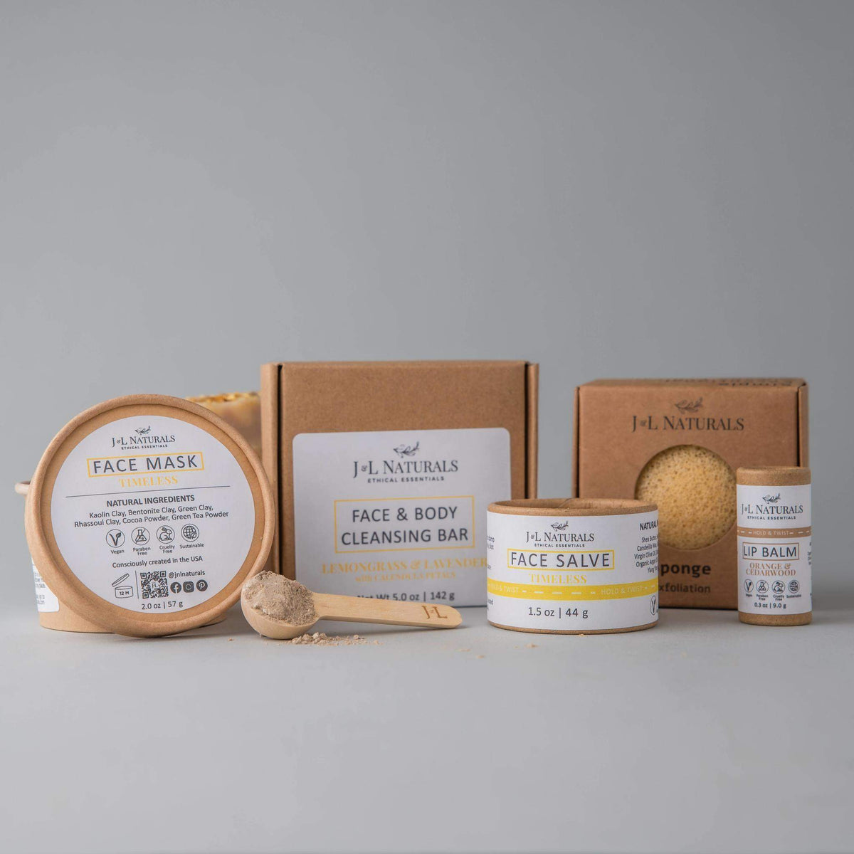 Timeless skincare set for mature skin including cleansing bar and face salve on wooden surface.