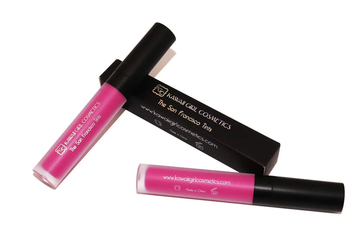 Close-up of vibrant hot pink Embarcadero Tint lip and blush cream with soft velvet texture