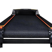 Treadmill on wooden floor highlighting textured anti-slip running belt
