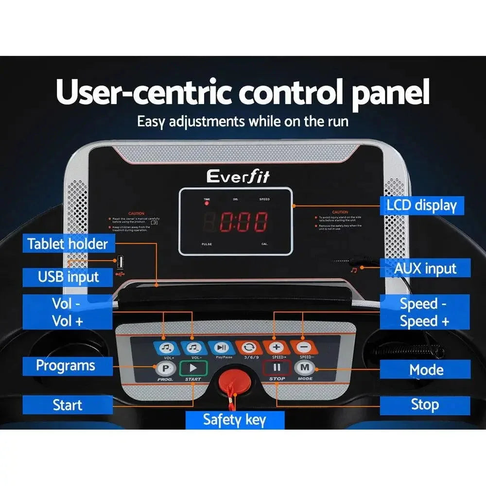 Treadmill displaying digital speed and workout data on LCD screen in bright lighting