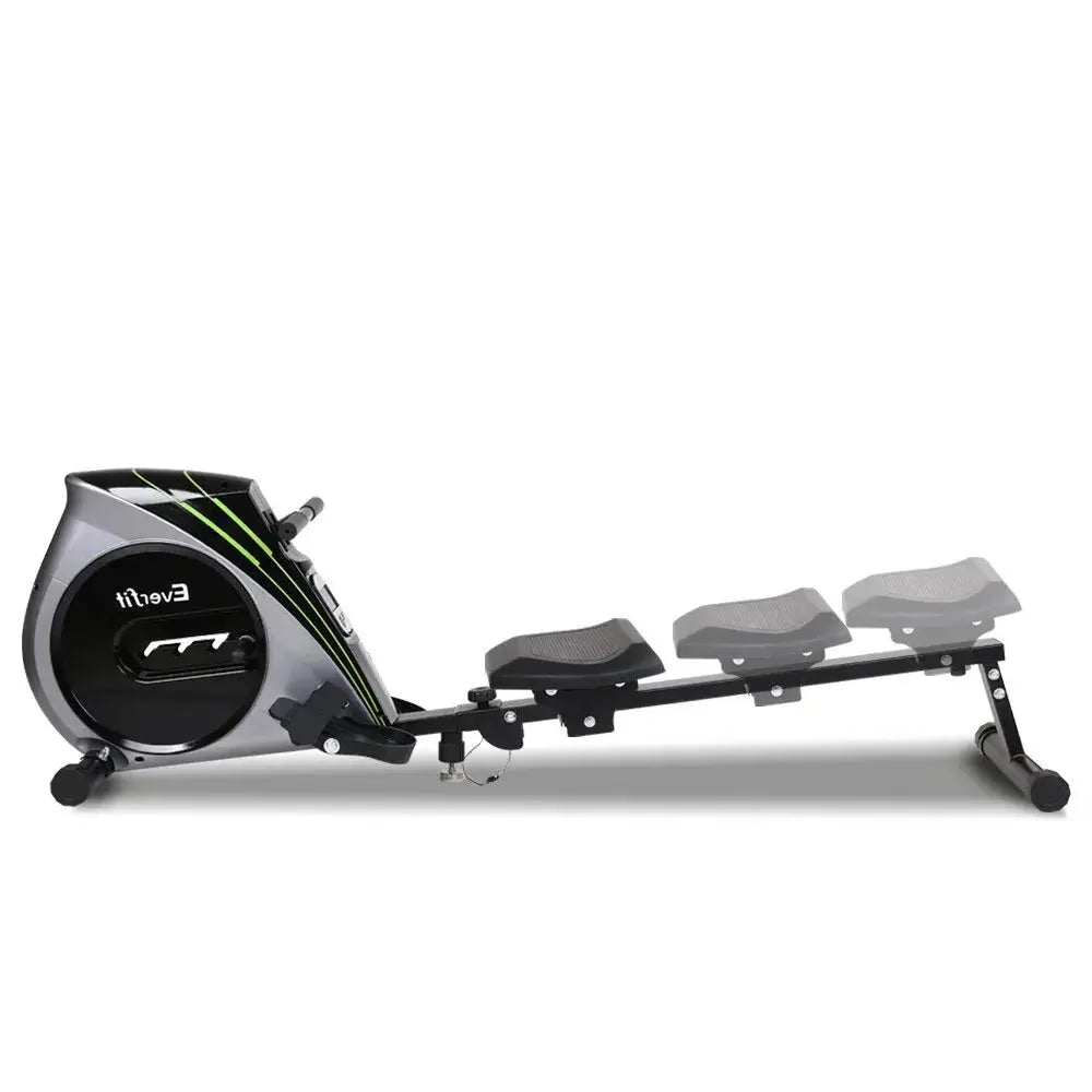 Rowing machine displayed in a home gym setting with visible large LCD console