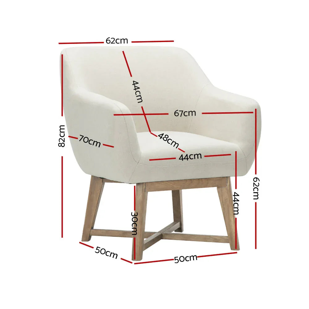 Side view of beige fabric armchair showcasing its curved back and thick cushioned seat